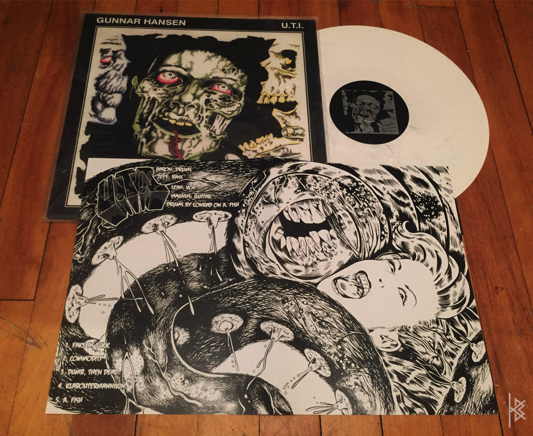 LP insert for Gunnar Hansen / U.T.I. split LP, Produced by Schizophrenic Records, 2011.