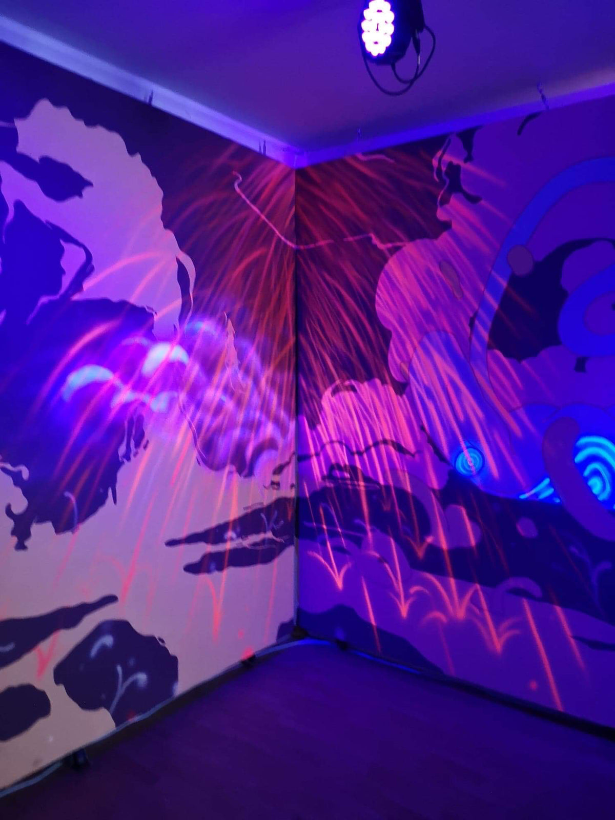KB. “Ember Waterfall”, UV Airbrush on Wall. 10’ x 8.5’, 2019