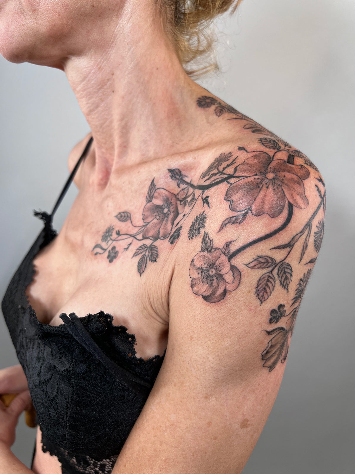 KB, "Wild Roses", Ink in skin, 12" x 13". 2024
