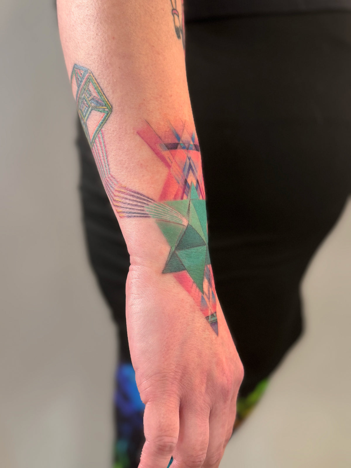KB, "4th Dimensional Merkaba" DETAIL, Ink in skin, 7" x 6". 2025