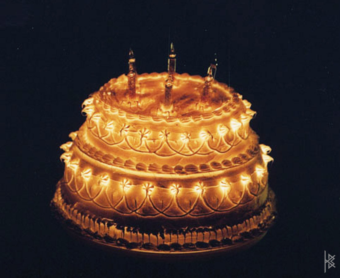 KB "Mom & Dot" Fiberglass, epoxy cake with moving lights, 1' x1', 2006.